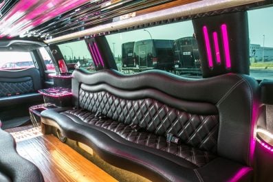 image of 16 passenger Dodge Ram stretched limousine interior view from front bench seat