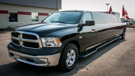 image of 16 passenger Dodge Ram stretched limousine exterior front passenger side