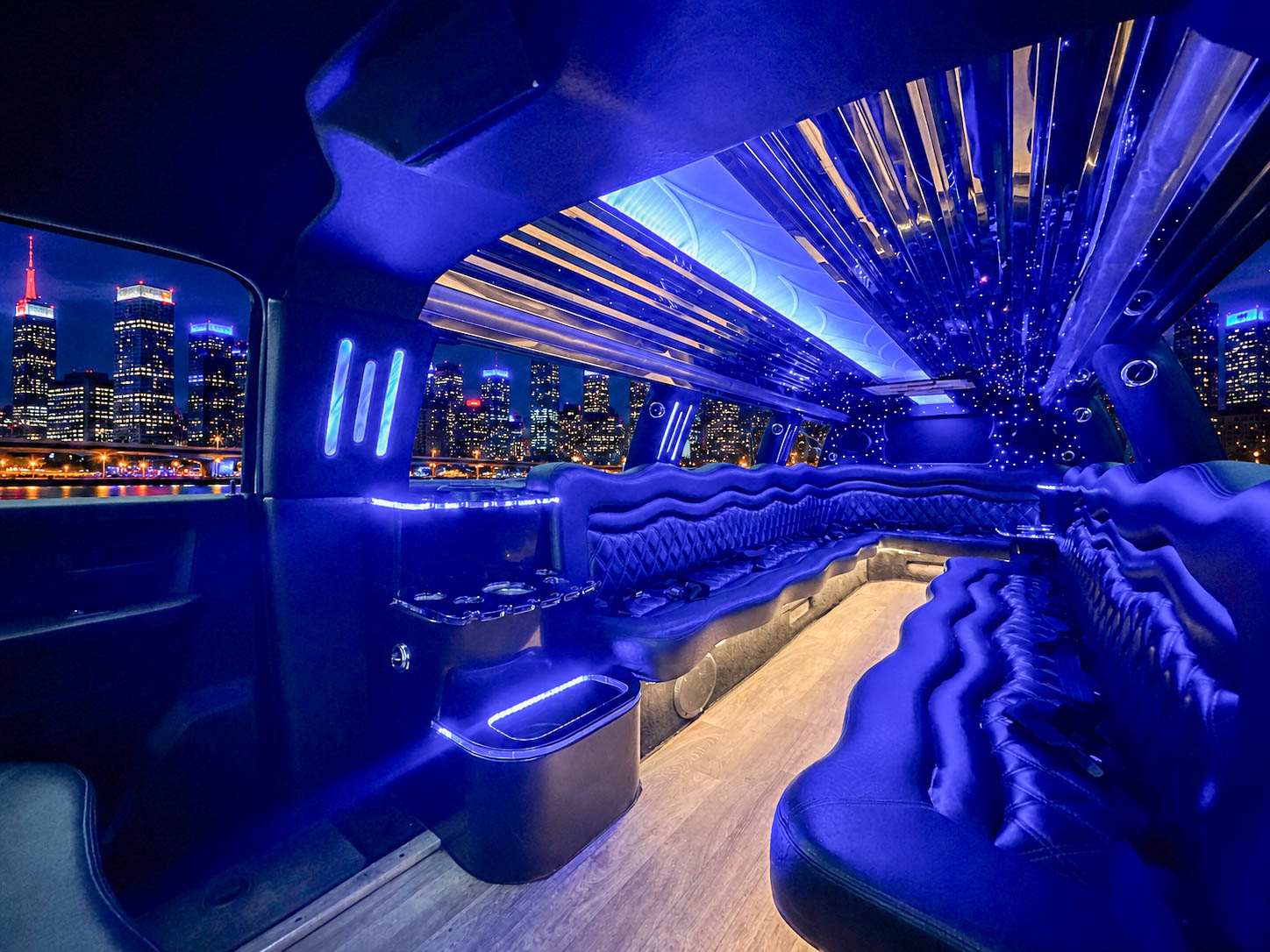 image of 16 passenger white Dodge Ram stretched limousine