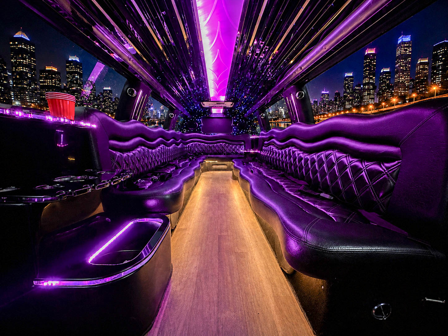 image of 16 passenger white Dodge Ram stretched limousine