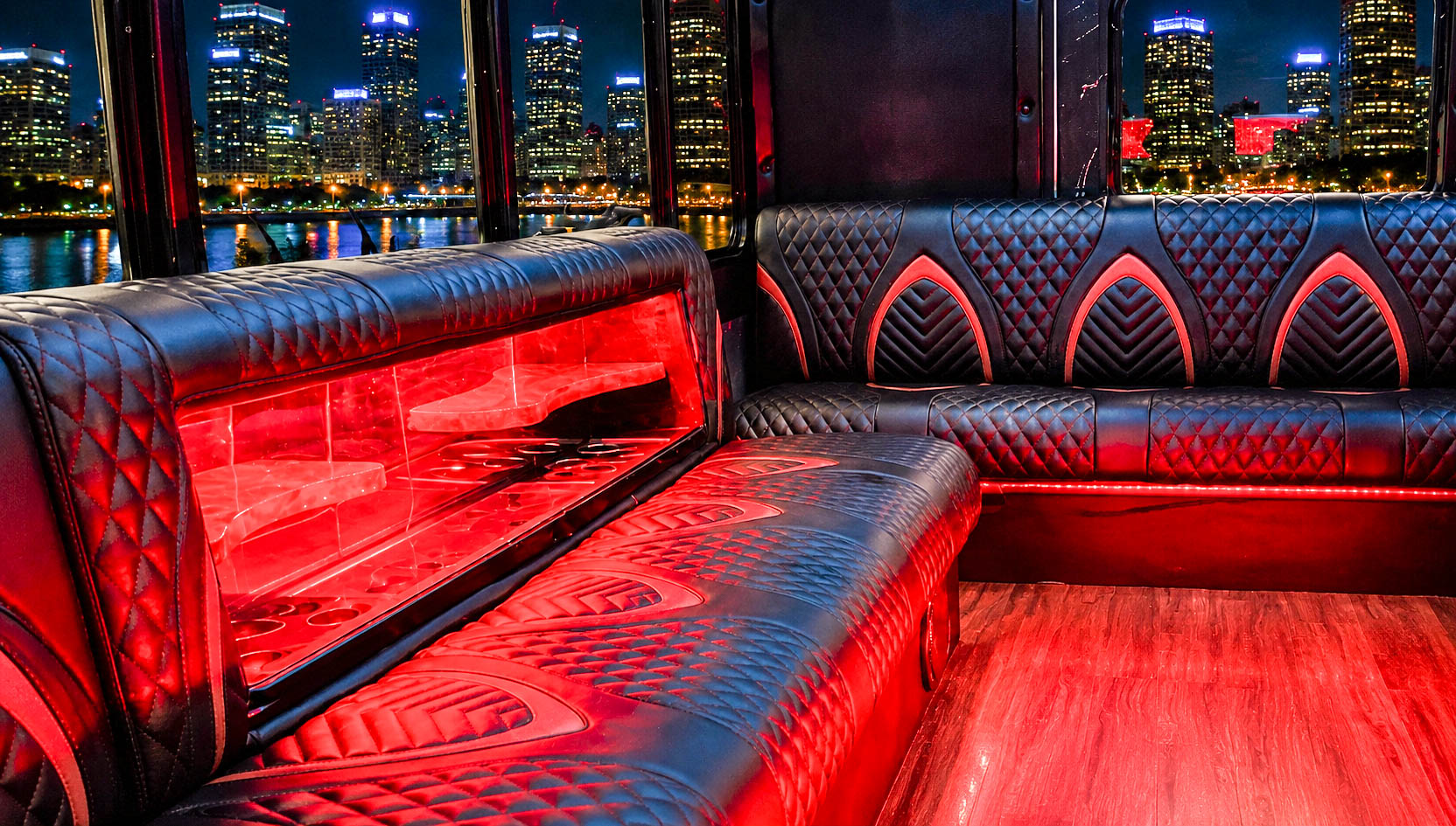image of 28 passenger white Party Bus interior taken from the back