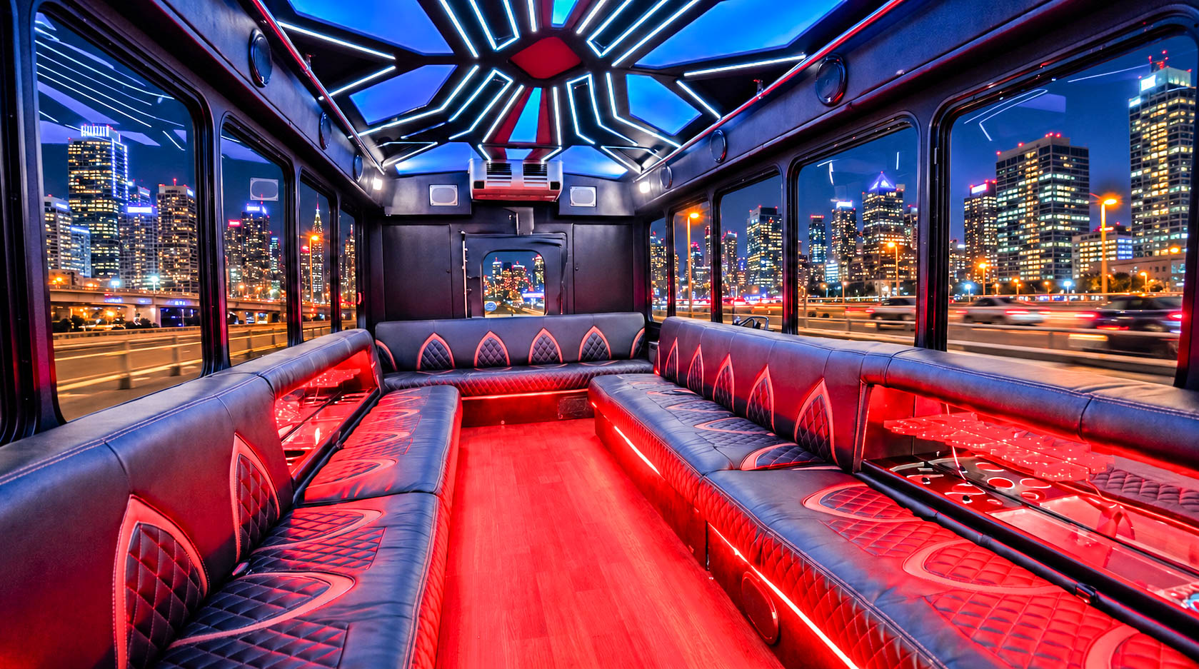 image of 28 passenger white Party Bus interior taken from front passenger side bench seat