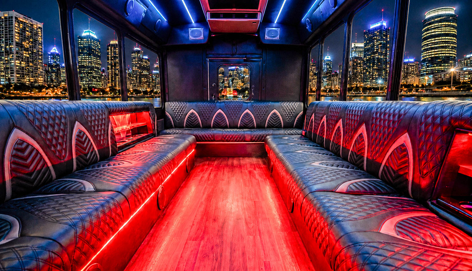 image of 28 passenger white Party Bus interior taken from rear driver side corner